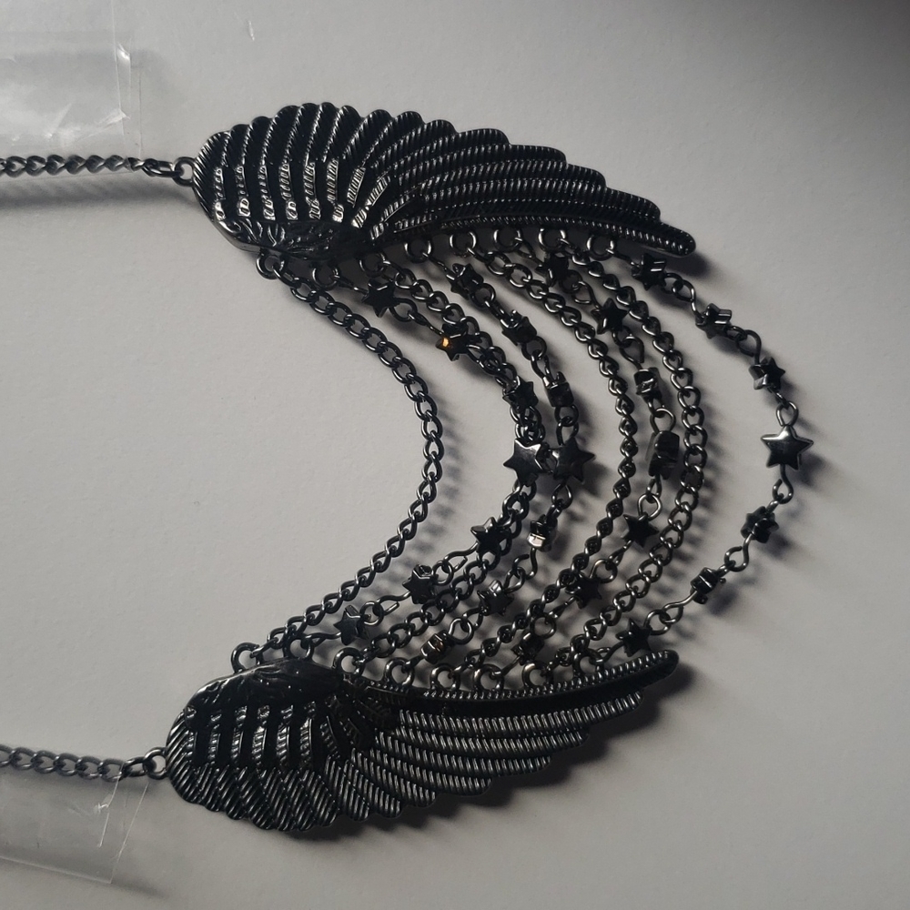 Dark gray Angel wings with stars